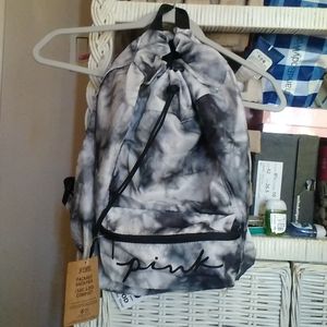 Pink light fabric has pulling string on the top